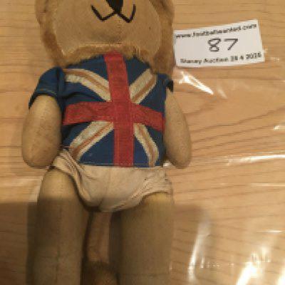 1966 World Cup Willie Lion Mascot Toy: Original 8 inch high WC Willie with tail intact in fair/good condition. Left leg may have been repaired at top.