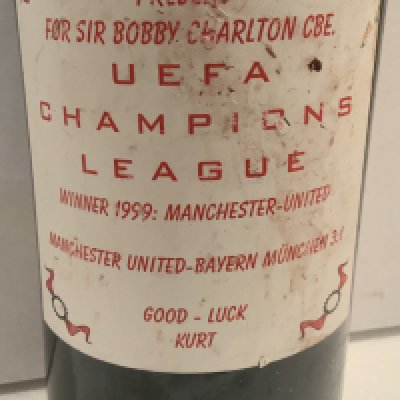 Bobby Charlton Manchester United Bottle Of Wine: Very large Marke 1978 Austrian Chardonnay. Label states Present for Sir Bobby Charlton UEFA Champions League Winners 1999 Manchester United with the score incorrectly printed 3-1. Also Good Luck Kurt.