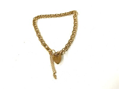 A 9ct gold heart lock bracelet.  Approx 5.7g.