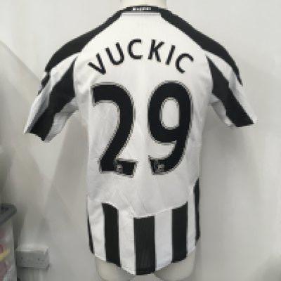 Newcastle 2010 - 2011 Match Worn Football Shirt: Home short sleeve shirt with Premiership badging to arms. Vuckic number 29 to rear. Worn v Arsenal on 27 October 2010.