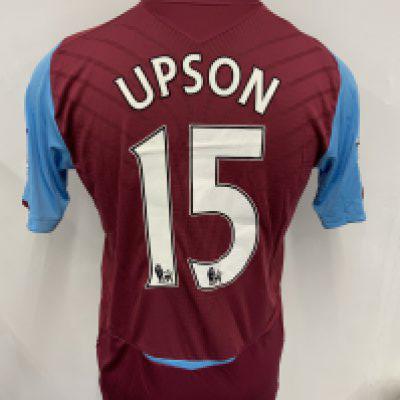 West Ham 2008 - 2009 Match Worn Football Shirt: Home short sleeve shirt with Premier league badging to arms. Upson Number 15 to rear. Worn v Tottenham on 8 December 2009. First occasion this shirt sponsor was used.