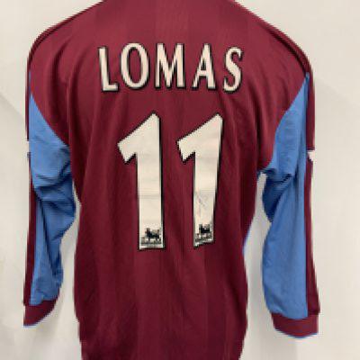 West Ham 1997 - 1998 Match Worn Football Shirt: Home long sleeve shirt with Premier league badging to arms. Lomas Number 11 to rear. Signed by player to the number.