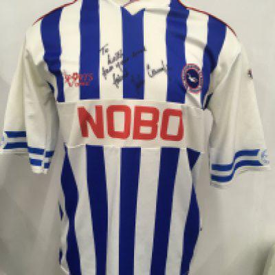 Brighton 1989 - 1991 Match Worn Home Football Shirt: Blue and white short sleeve home shirt with Nobo sponsorship. Football League badging to arms. Number 2 to rear worn by John Crumplin who made 207 appearances for Brighton. Signed with dedication.