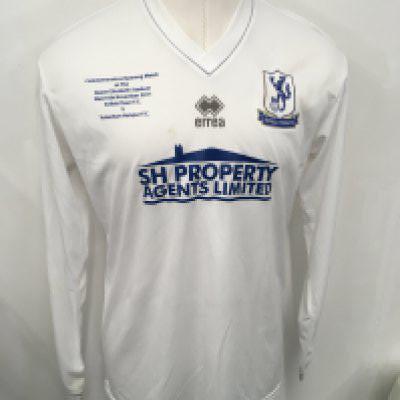 Enfield v Tottenham Match Worn Football Shirt: Long sleeve number 9 white Enfield shirt worn v Tottenham on 16 11 2011 with a few small marks. Match details to breast. Programme and ticket for match included.