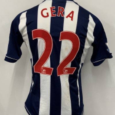 Gera West Brom 2012 - 2013 Match Worn Football Shirt: Blue and white short sleeve with Gera number 22 to rear. Premier League badging to sleeves. Swapped with Bobby Zamora. Unwashed.
