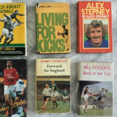Manchester United Signed + Dedicated Football Books: Autobiographies of Harry Gregg Denis Law Bill Foulkes Alex Stepney Bobby Charlton and Eric Cantona. Mainly dedicated to Nick. Harry Gregg has not signed directly onto book. Additionally Alex Stepney has also signed a photo and Foulkes has additionally signed a few magazine pictures. (6)