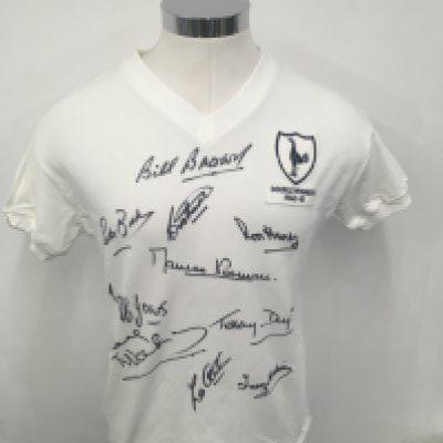 Tottenham 1961 Signed Football Shirt: Famous double winning team white home replica shirt signed to front by 10 including Brown Norman Dyson Henry Medwin Allen Jones Baker Smith and Mackay. Personally obtained by vendor who used to arrange dinners in their honour.