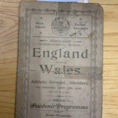 25/26 Wales v England Schools Football Programme: Played at then league club Aberdare on 17 4 1926. Poor condition 4 pager with heavy folding and a small piece missing from rear page not affecting any text. England fielding schoolboys Cliff Bastin and Goulding of West Ham.