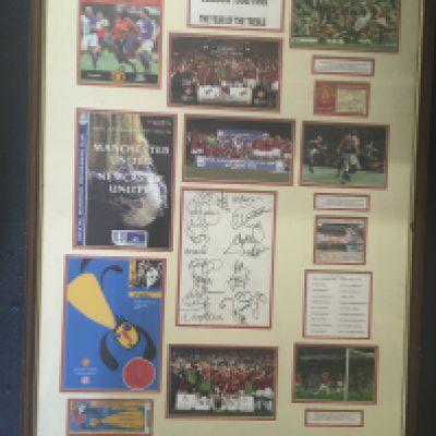 Manchester United 98/99 Treble Season Signed Framed Display: Massive item with original programmes and tickets for the FA Cup Final and Champions League Final. There is a large page with 21 autographs including Beckham Keane and Sheringham. To the right of autographs there is a signature map and so much more. Nice item and not for posting.