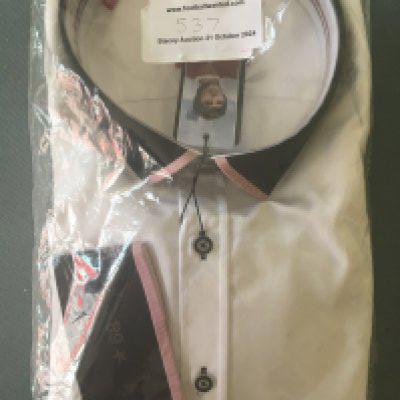 George Best Boutique BNWT Collared Shirt: Great piece of memorabilia and possibly from Bests own Boutique in London which was named Edwardia. We cannot confirm this but it has been with this collector since the 90s. With 68 to black cuffs on white shirt size 4XL this shirt is still in its wrapping with George Best labelling.