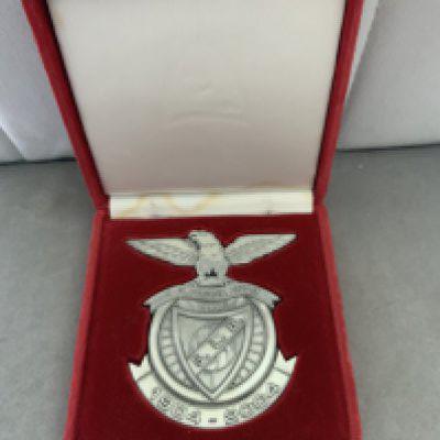 Benfica Centenary Boxed Football Emblem: 1904 - 2004 metal plaque measuring 10 x 10 cm in red suede effect case. Nice item.