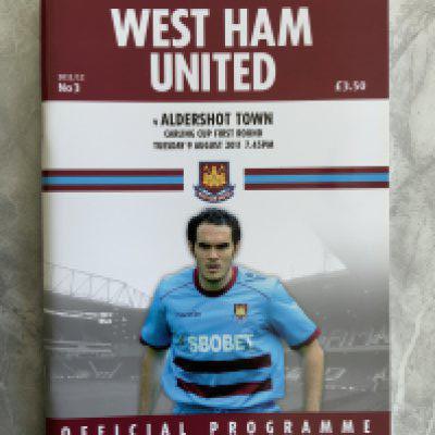 2011 - 2012 West Ham v Aldershot Postponed Football Programme: Mint condition dated 9 8 2011 for the Carling Cup match that was postponed due to the London Riots.