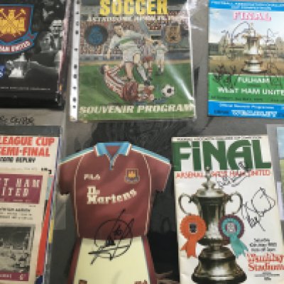 West Ham Football Memorabilia Box: Programmes including 1967 Real Madrid in Houston with slight damage, testimonials, European, cup finals plus books, Directors reports, 1975 FA Cup final record, programme binders, signed cup final programmes, Di Canio signed mouse mat, press reports and more. Instructions to sell. (2 boxes)