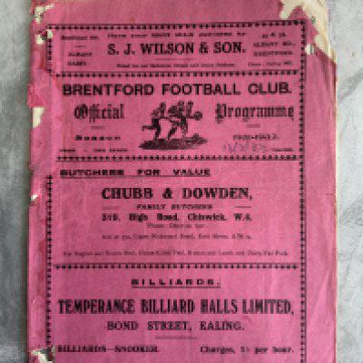 31/32 Brentford v Cardiff City Football Programme: Large pink style in poor condition with tears punch holes and paper loss.