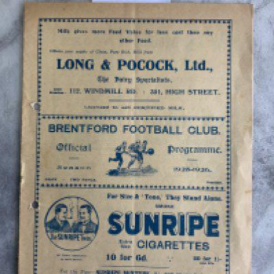 25/26 Brentford v Swindon Football Programme: Last of the cream style which has punch holes and a small bit of paper loss to rear border. No team changes but score written inside.