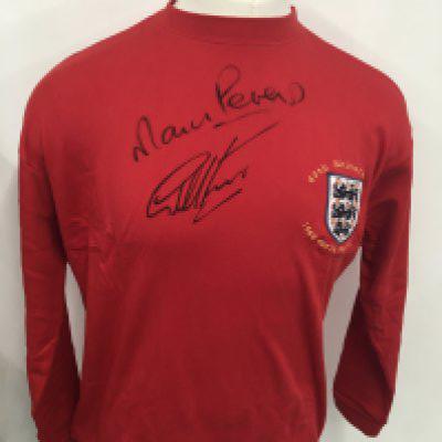 England 1966 World Cup Signed Football Shirt: Red 40th Anniversary shirt produced in 2006 signed by England winning goal scorers Peters and Hurst. Coa from reputable source.
