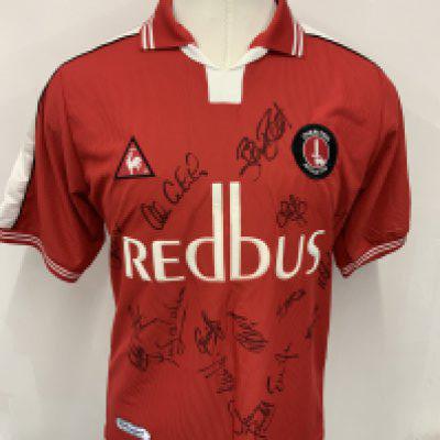 Charlton 2001 - 2002 Signed Home Shirt: Red Le Coq Redbus sponsored shirt signed to front by 15 players.
