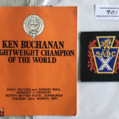Ken Buchanan 1971Tribute Signed Boxing Menu: Folded banquet menu held by the Daily Record in honour of the lightweight champion of the world. Signed inside and dedicated. C/W a Scottish Amateur Boxing Club cloth badge that was designed to be sewn onto blazer.