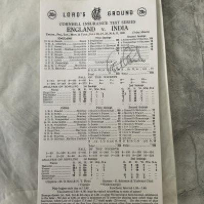 Graham Gooch 333 England Cricket Memorabilia: Scorecard for the famous match v India in 1990 which has been signed by Gooch. C/W a signed press photo of him opening champagne wearing England kit and a similar picture of him on the front cover of Wisden Monthly. (3)