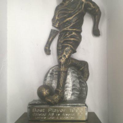 Paul Merson 1995 Player Of The Match Award: Ten inch high football figure with wording Best Player 1995 and match details for Hallstads v Arsenal. One arm has snapped off but is present and will need glueing.