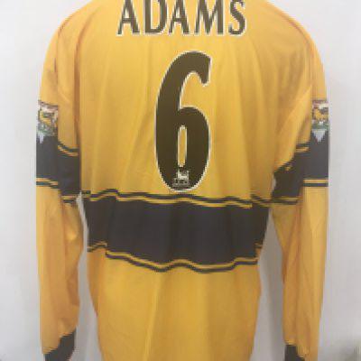 Arsenal 98/99 Adams Match Worn Away Football Shirt: Yellow with blue trim long sleeve Nike JVC sponsored shirt. Adams number 6 to rear. Both sleeves have gold Premier League badging stating Champions 1997 - 1998. Obtained by Paul Merson.