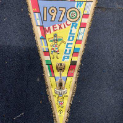 Mexico 1970 World Cup Large Football Pennant: 50cm long colourful original pennant with England winners 1966 and World Cup Willie at the bottom. Flags of participating nations to edge.