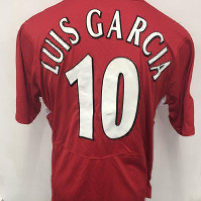 Liverpool 2004 - 2005 Garcia Match Worn Football Shirt: Red short sleeve Reebok Carlsberg sponsored. Rear has number 10 Louis Garcia with Champions League patch to sleeve. Signed to front by Garcia. Obtained by Paul Merson. Liverpool were Champions League winners this season and Garcia scored some important goals along the way. We do not know which game this was from.