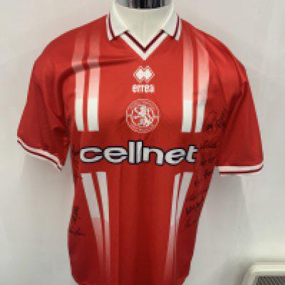 Middlesbrough 1998 - 1999 Signed Football Shirt: Red home Errea Cellnet short sleeve shirt Obtained by Paul Merson who had just left for Aston Villa. Maybe a parting gift as not signed by him. Signed clearly to front by 12 players.