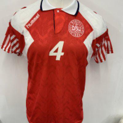 Denmark Euro 92 Match Worn Football Shirt: Red Hummel short sleeve number 4 shirt with Olsen to rear. Swapped with Englands Paul Merson. Olsen was captain and went on to win Euro 92 with Denmark.