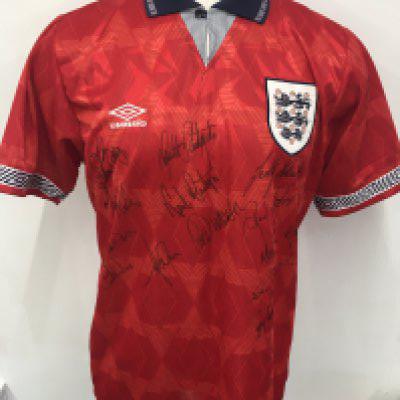 1992 Paul Merson England B Match Worn Football Shirt: Red away short sleeve with blue collar. Number 15 to rear. Signed by 13 squad members including Merson Le Saux Southgate Dixon and Martyn.