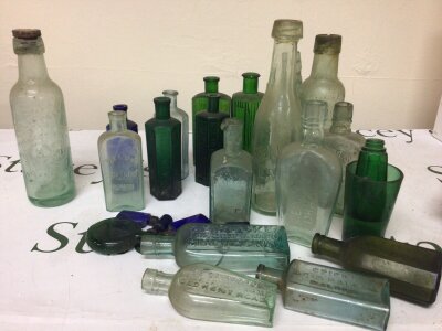 A Collection of antique bottles including green glass poison bottles also other bottles Cricks Acid Balsam Maldon, A&F Pears London The Duncannon Charing Cross and many others. NO RESERVE,.