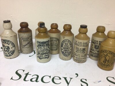 A Collection of Stoneware Ginger Beer bottles including local bottles Ye Olde Essex Ginger Beer Chelmsford old style Ginger Beer Southend and others (9) NO RESERVE.