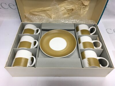 A boxed mid 20th Century Susie Cooper coffee set.
