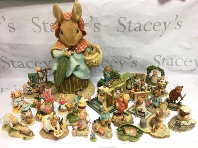 A large collection in two boxes of mainly Beatrix Potter character ceramics including examples by Border Fine Arts and others including limited editions. Also includes some small Wade Disney figures (2).