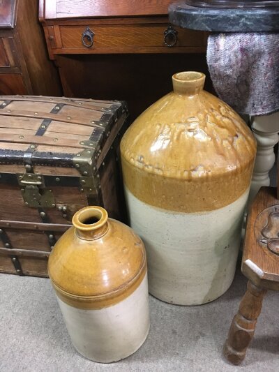 Two large stoneware bottles, largest approx 70cm.