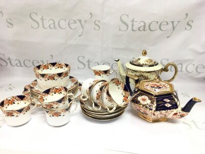 An Edwardian Crown Derby style porcelain tea set plus a hand painted teapot.