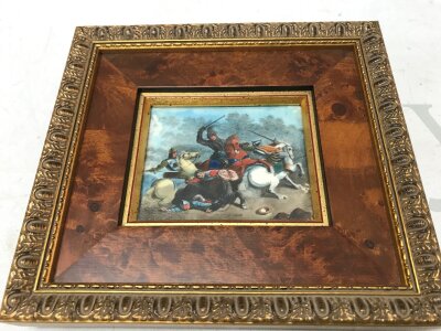 An 18th century miniature depicting a cavalry battle scene, framed later. Frame size 18x16cm. Picture 9x7cm