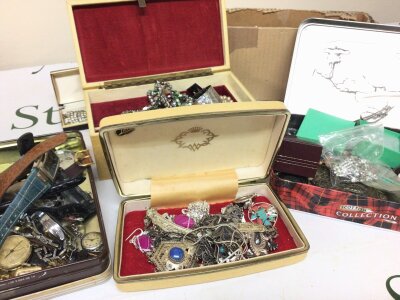 A Collection of Costume jewellery including modern silver jewellery a tin containing mixed used worn watches and other ornaments.