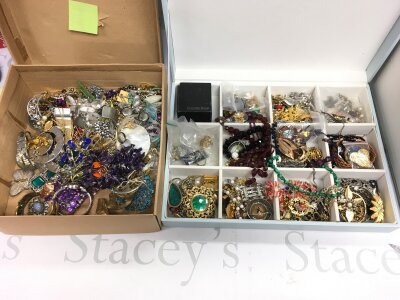 Two boxes of costume jewellery.
