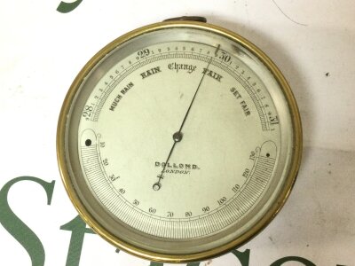 A small Dolland brass barometer, 12cm wide