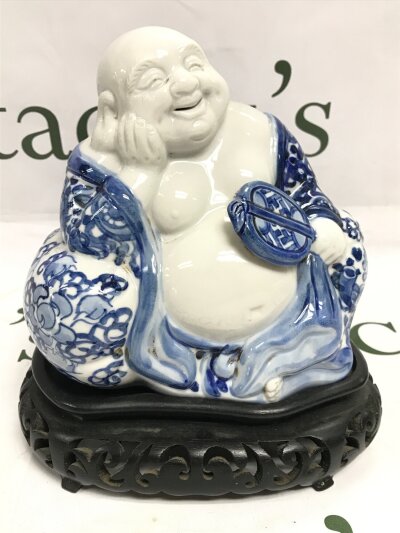 Porcelain Chinese blue and white Buddha figure (16cm tall, 16cm wide) on a wooden stand- NO RESERVE