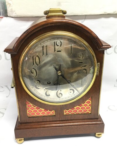 A late 19th Century mahogany 8 day bracket clock with Arabic numerals on a silvered dial, approx. height 40cm.- NO RESERVE