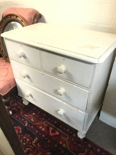 A white painted chest of drawers. 84cm wide , 82cm tall , 46cm long