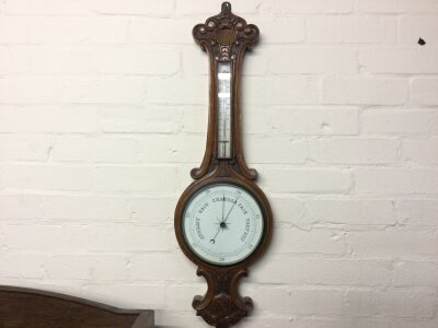 An oak Barometer, 82cm long