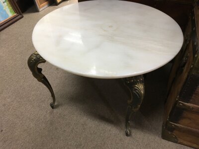 A circular white marble and metal occasional table, approx diameter 60cm.