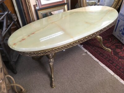 An Onyx and metal coffee table, approx length 116cm.