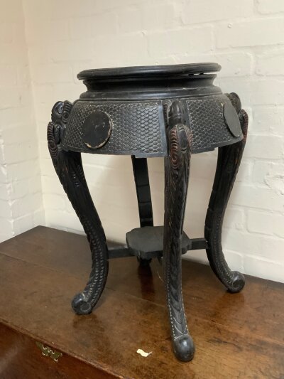 A small Chinese pedastal occasional table. 62cm
