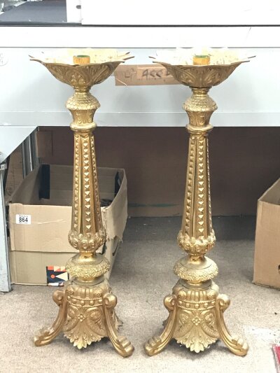 A pair of large gilt candlesticks 66cm tall. No reserve .