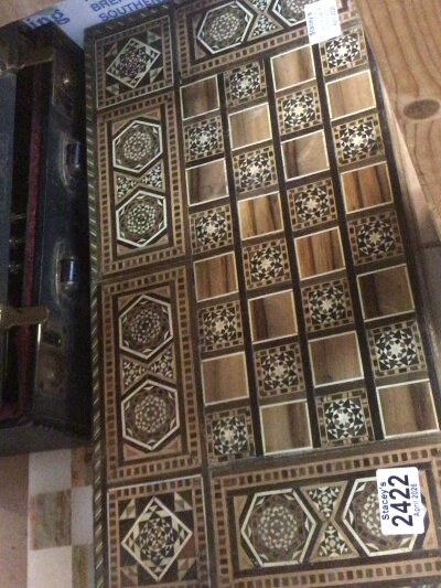A Syrian Moorish inlaid Games box and an onyx games board (2)