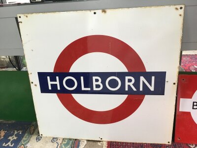 An enamel underground station sign for Holborn, approx 71cm x 66cm.